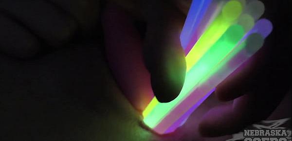  opening up teen pussy with glowsticks